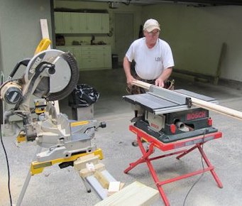 Lenny trimming one of the straight splines outside the garage